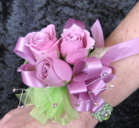 purpleandgreencorsage.jpg
